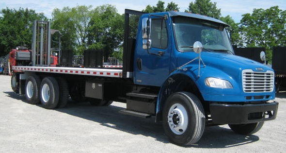 Moffett truck with aluminum flatbed and Moffett mounted on back